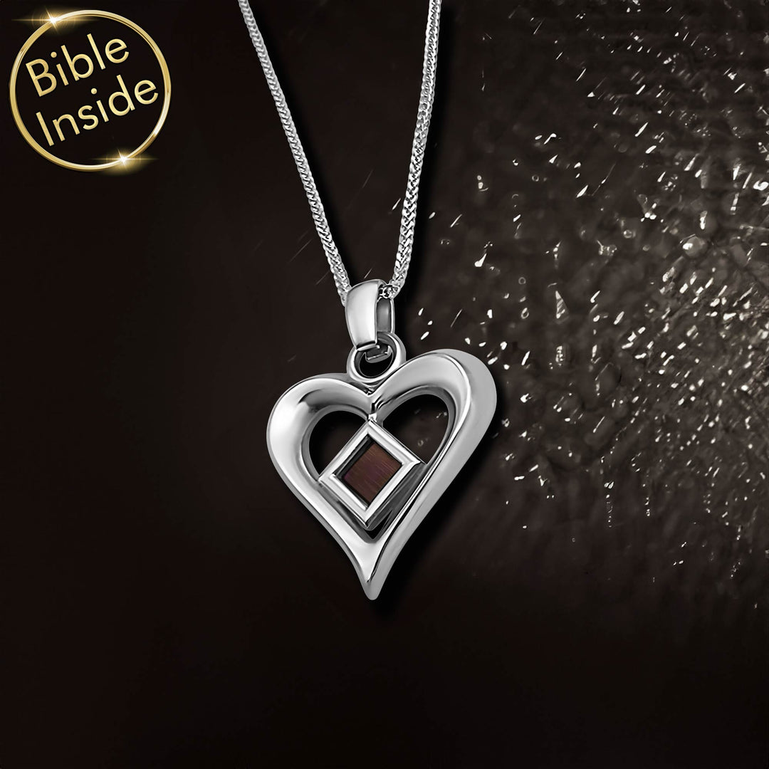 Bible gifts heart jewelry featuring microscopic New Testament for modern Christian believers and meaningful gift giving