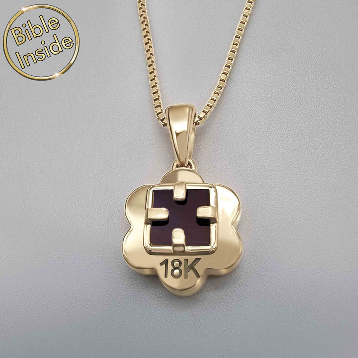 Biblical pendant featuring diamond flower design and New Testament chip