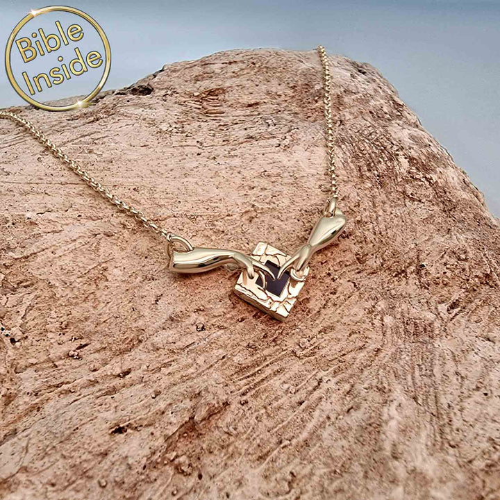 Christian jewelry with Genesis symbol and complete New Testament chip