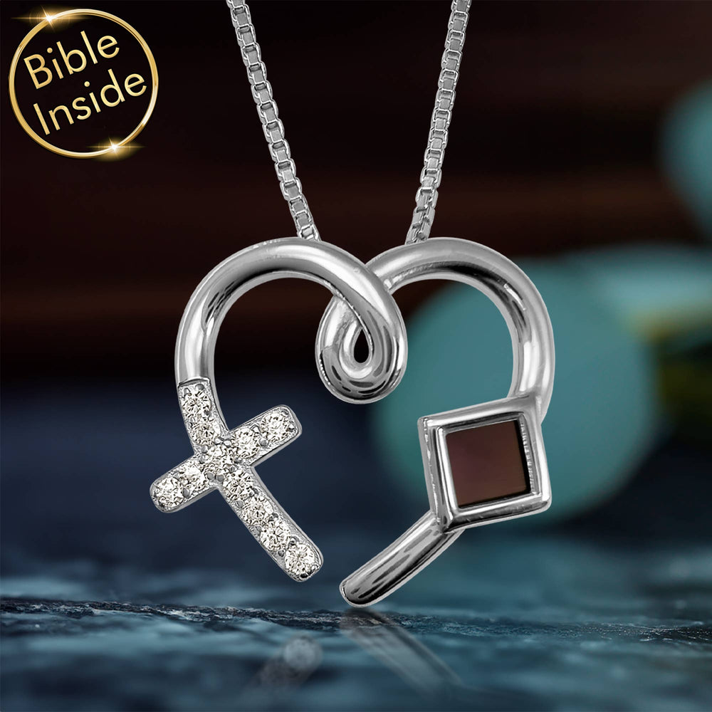 Dainty silver heart necklace for women, holding the New Testament close