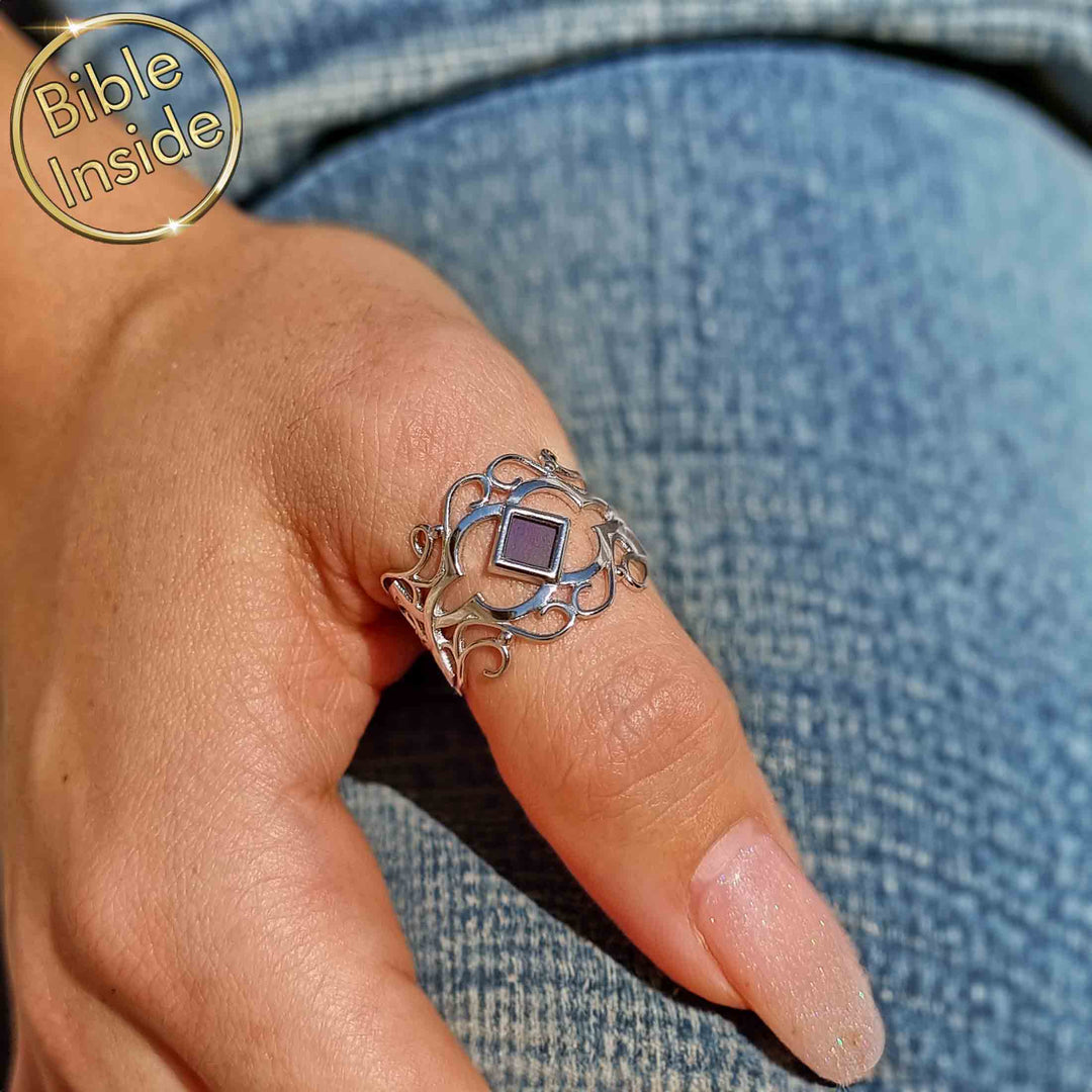 White gold jewelry for females with miniature Bible technology inside