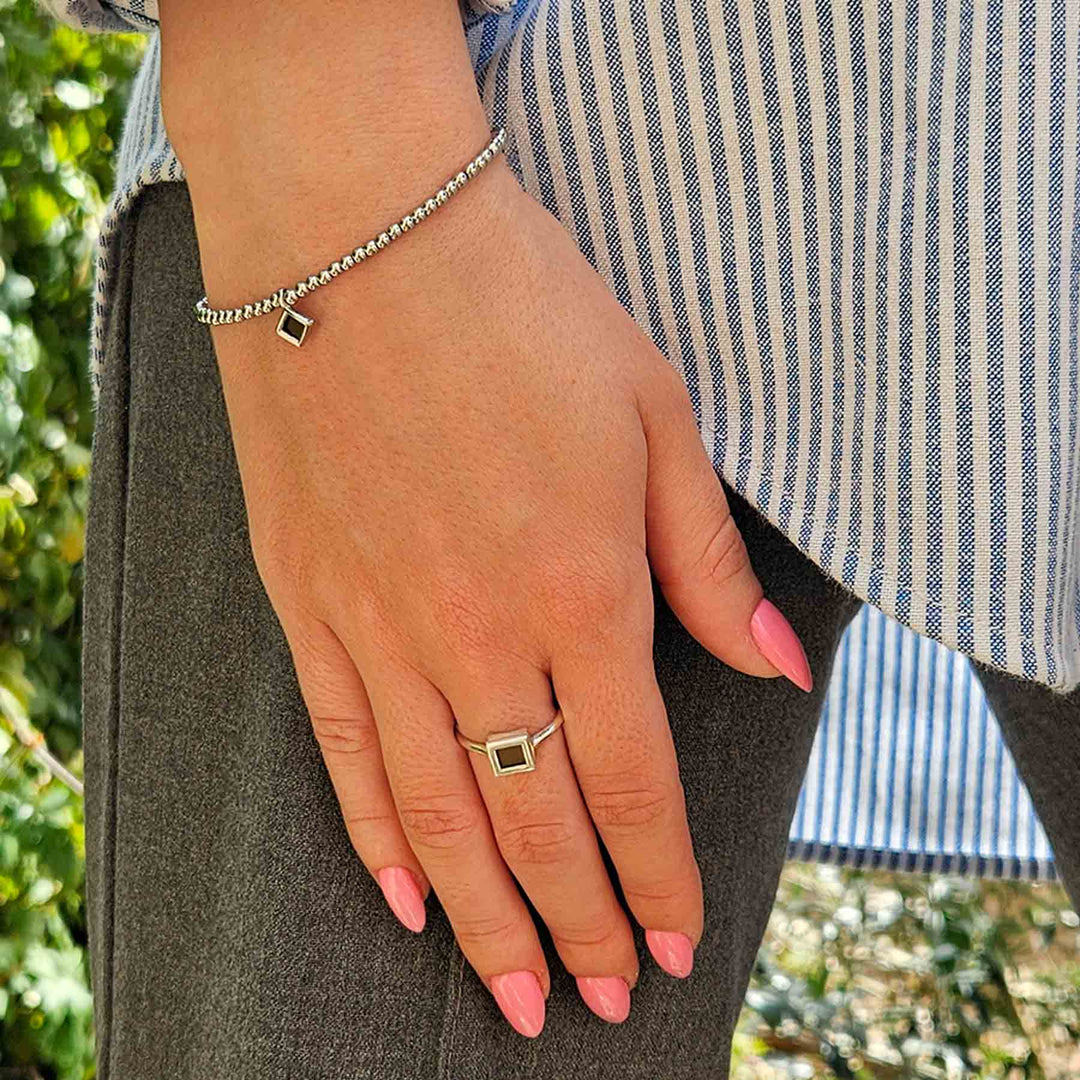 Stainless steel bracelet featuring miniature Bible chip for women
