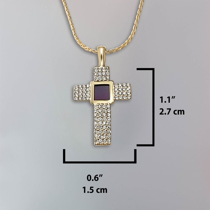 Gold cross and chain featuring miniature Bible chip for women