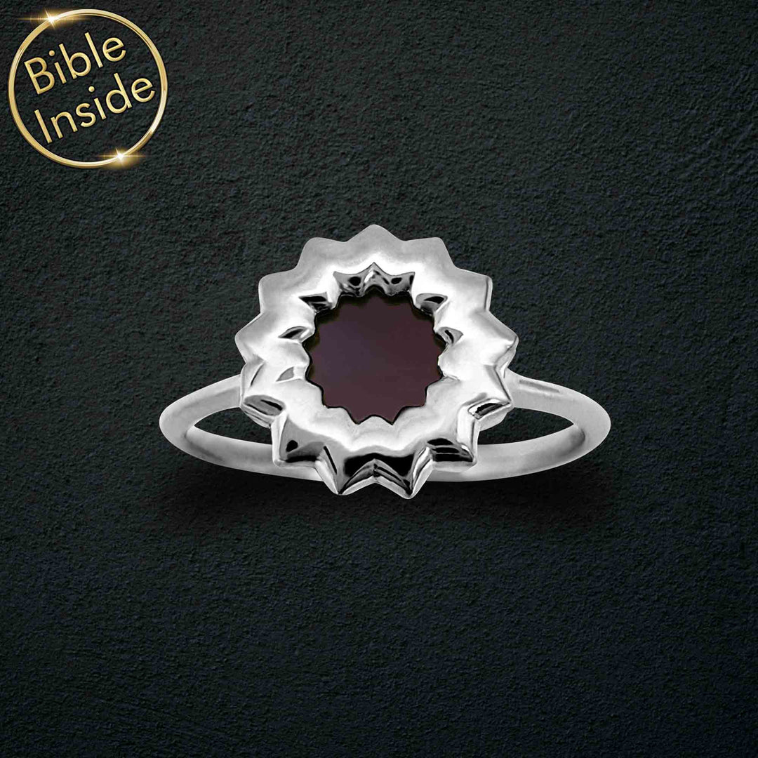Silver religious ring for women with flower symbol and miniature Bible inside