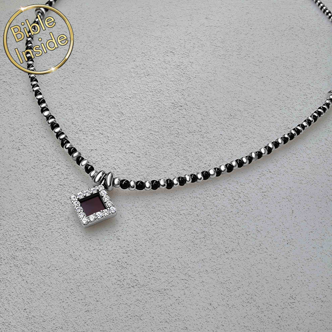 Best gift ideas for Valentine's day close-up of onyx pendant showing nano Bible chip detail