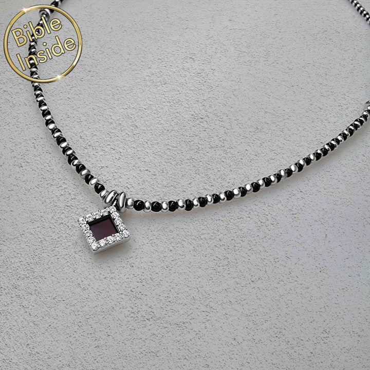 Best gift ideas for Valentine's day close-up of onyx pendant showing nano Bible chip detail